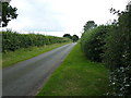 SJ9409 : Woodlands Lane near the Woodlands Lane fishery by Richard Law