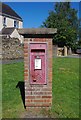 Pillar-mounted Elizabeth II postbox, Rock Close, Carterton, Oxon