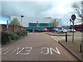 TL1020 : Luton Airport Parkway station approach road by Malc McDonald