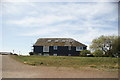 View of a house called Harbour Point from Rye Harbour