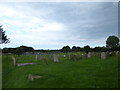 TG4919 : Holy Trinity and All Saints, Winterton on Sea: churchyard (c) by Basher Eyre
