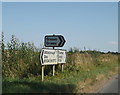 TM1188 : Roadsigns on the B1134 Long Row by Geographer