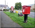 Elizabethan postbox and telephone box on the A698, Cornhill on Tweed