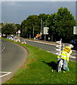 IRIS bicycle on the grass strip in the middle of the A534 Crewe Road, Crewe