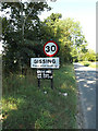 TM1484 : Gissing Village Name sign on Burston Road by Geographer