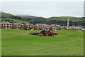 NX1897 : Grass Cutting at Stair Park, Girvan by Billy McCrorie
