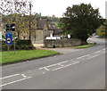 Black and blue signs facing Bath Road, Woodchester