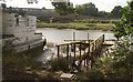 SX9787 : Boat and jetty, River Clyst by Derek Harper