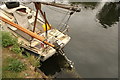 View of the propeller on the small boat moored on the River Lea