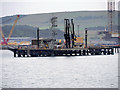 NH7868 : Nigg Oil Terminal Pier by David Dixon