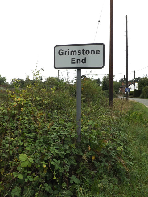Grimstone End Village name sign on Mill Road