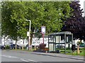 Bus shelter and Millennium sign