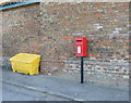 Elizabeth II postbox and grit bin on Low Field Lane, Haisthorpe