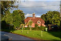 Houses by the green at Kilmeston