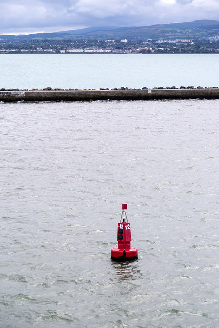 Red port channel buoy number 12