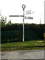 TM1685 : Signpost on Gissing Road by Geographer