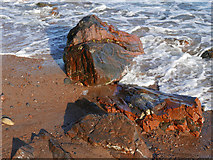 NH7459 : Rocks on the seashore near Scart Craig by Julian Paren