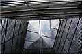 Looking up at a reflection of the building detail in More London #5