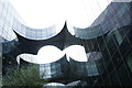 View of the Batman-like reflection in one of the buildings in More London