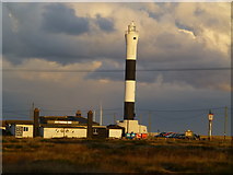 TR0916 : Britannia Inn and lighthouse at sunset by Ron Lee