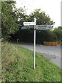 TM1589 : Signpost on Tibenham Road by Geographer