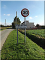 TM1289 : Tibenham Village Name sign on Mill Road by Geographer