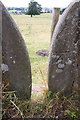 Benchmark on stile in wall beside Wood Lane