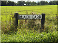TM0995 : Black Carr sign by Geographer