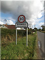 TM1094 : Bunwell Village Name sign on Mile Road by Geographer