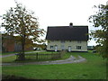 Thatched cottages on Station Road (B1134)