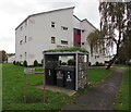 Green roof wheelie bin shelter in front of Ashton House, St Dials, Cwmbran