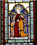 SP9799 : Tixover, St. Luke's Church: Foreign glass panel of St. Katherine by Michael Garlick