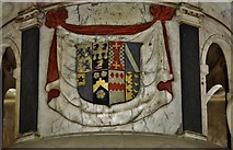 TL0295 : Apethorpe, St. Leonard's Church: The Mildmay Monument; coat of arms by Michael Garlick