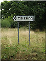 TL9018 : Roadsign on Harborough Hall Road by Geographer