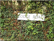 TL8918 : Lodge Road sign by Geographer
