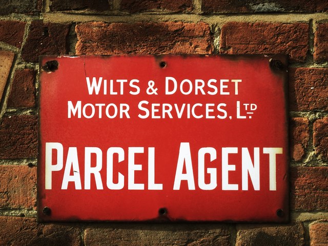 Enamelled sign on wall of disused pub, Oare, Wiltshire