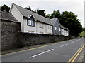 Houses behind a stone wall, Machynlleth