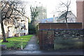 Path beside Nos. 94-114 Toothill Road: All Saints Church in background