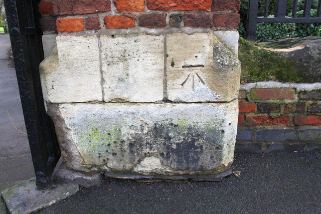 Benchmark on gatepost at entrance to Abbey Park from St Margaret's Way