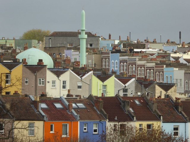 A mosque and colourful houses