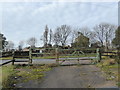 SJ8350 : Gate on to A34 and High Carr Farm by Jonathan Hutchins