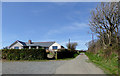 Bungalow and lane south of Elmscott, Devon