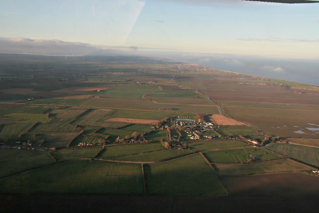Anderby, across Manor Farm towards Sutton on Sea: aerial 2016