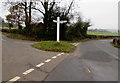 White signpost at crossroads west of Tredunnock