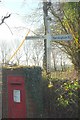 Signpost and postbox, Ebberly Arms