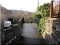 West across a 17th century stone arched bridge, Aberbeeg