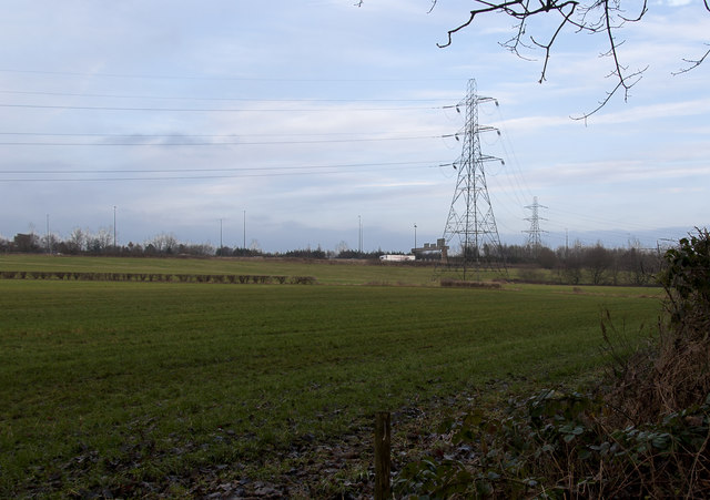 Electricity pylon with the M60 beyond