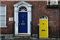 SZ3295 : Big blue door, little yellow door by David Martin