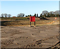 A surface water attenuation lagoon under construction