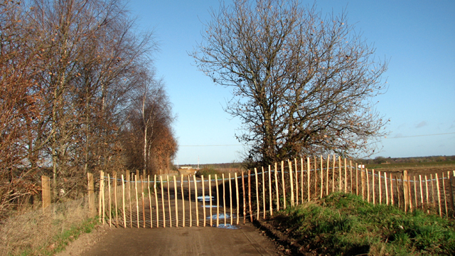 Fence across Bell Farm Lane